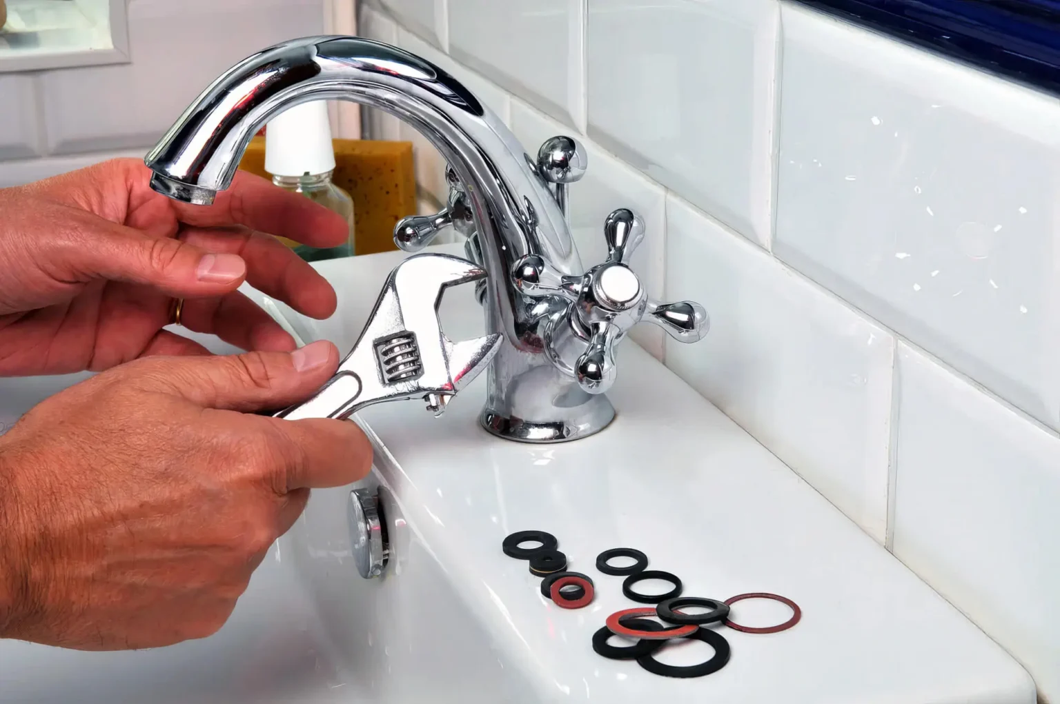 Plumber maintaining a bathroom faucet in Baldwin Park