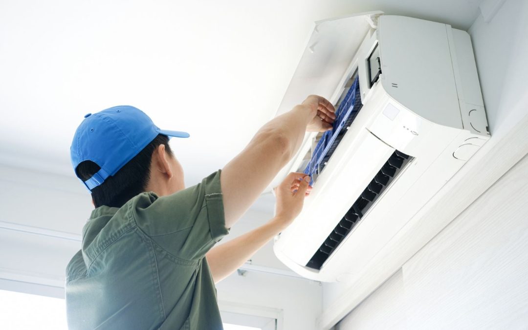 HVAC technician servicing a ductless mini split in Baldwin Park